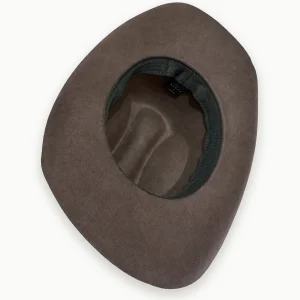 SKU cwb01 — vista interior do chapéu cowboy castanho em lã, com fita ajustável e etiqueta visível.